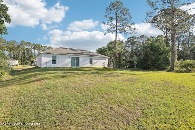 982 Pyracantha St NW, Palm Bay, FL 32907 - view of grassy yard
