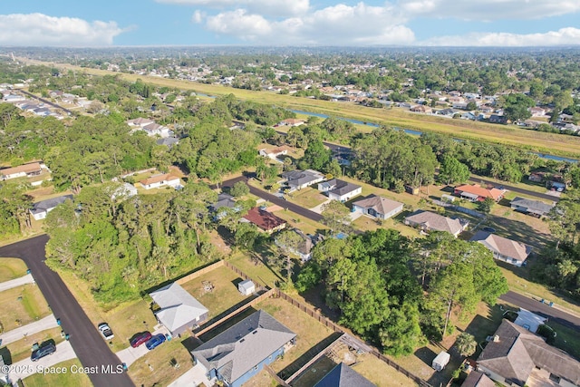 982 Pyracantha St NW, Palm Bay, FL 32907 - aerial view of property and surrounding area with nearby suburban area