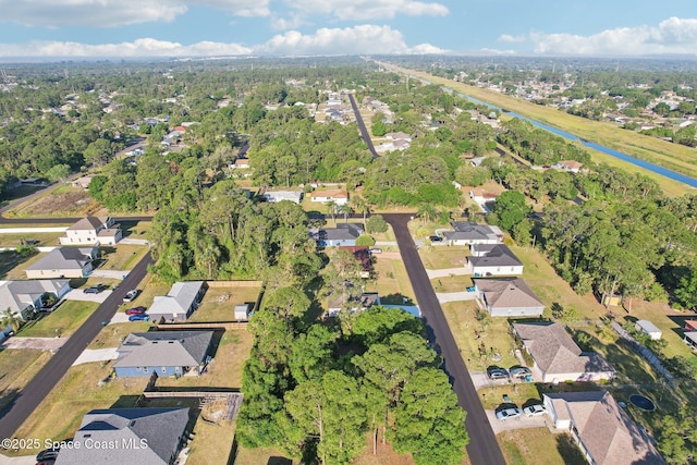 982 Pyracantha St NW, Palm Bay, FL 32907 - aerial view of property and surrounding area featuring nearby suburban area