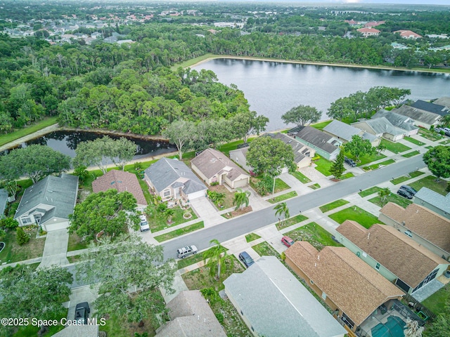 1459 Crane Creek Blvd, Melbourne, FL 32940 - aerial view of property and surrounding area featuring a large body of water and nearby suburban area