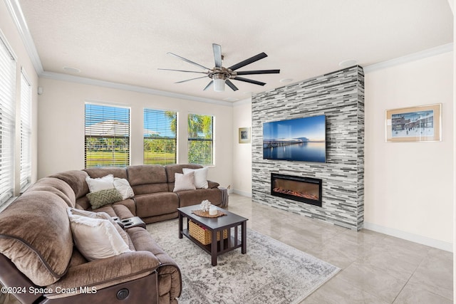 8522 Strom Park Dr, Melbourne, FL 32940 - living room featuring ceiling fan, ornamental molding, and a tiled fireplace