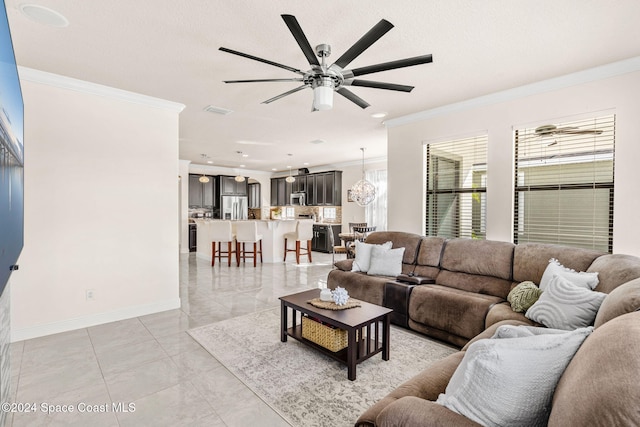 8522 Strom Park Dr, Melbourne, FL 32940 - living room with ornamental molding and a ceiling fan
