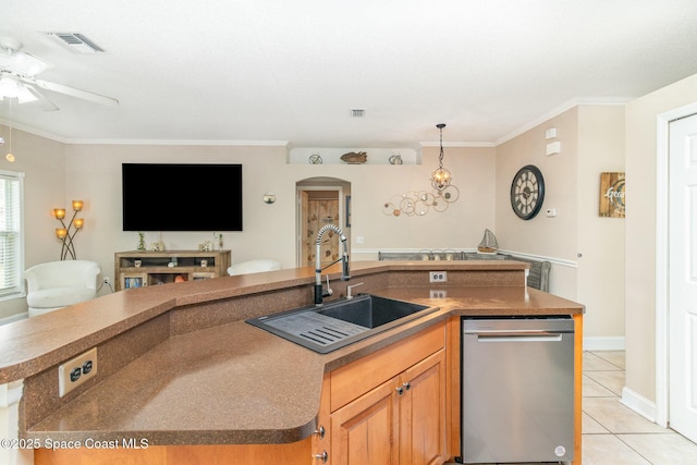 1510 Gardenton St NW, Palm Bay, FL 32907 - kitchen with dishwasher, arched walkways, ceiling fan, light tile patterned flooring, and open floor plan
