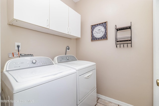1510 Gardenton St NW, Palm Bay, FL 32907 - laundry area featuring cabinet space, independent washer and dryer, and light tile patterned flooring