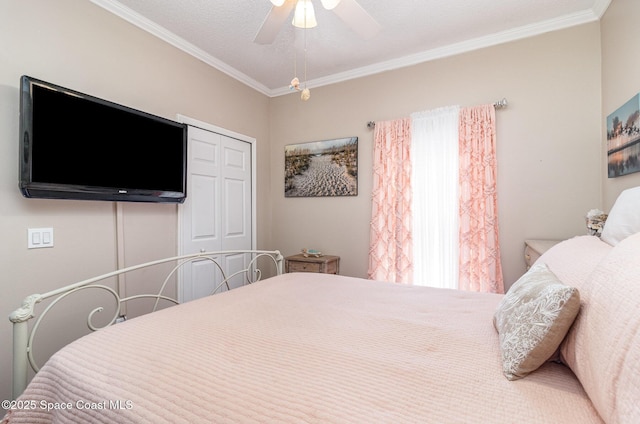 1510 Gardenton St NW, Palm Bay, FL 32907 - bedroom with a closet, ornamental molding, and a ceiling fan