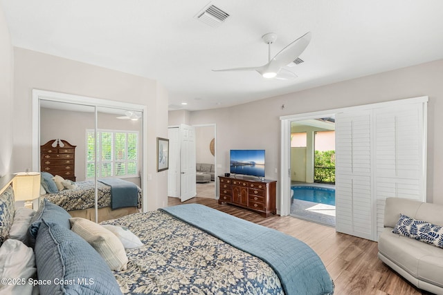 172 Whaler Dr, Melbourne Beach, FL 32951 - bedroom with wood finished floors, a closet, and a ceiling fan