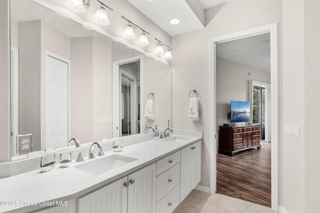 172 Whaler Dr, Melbourne Beach, FL 32951 - full bathroom featuring double vanity and tile patterned floors