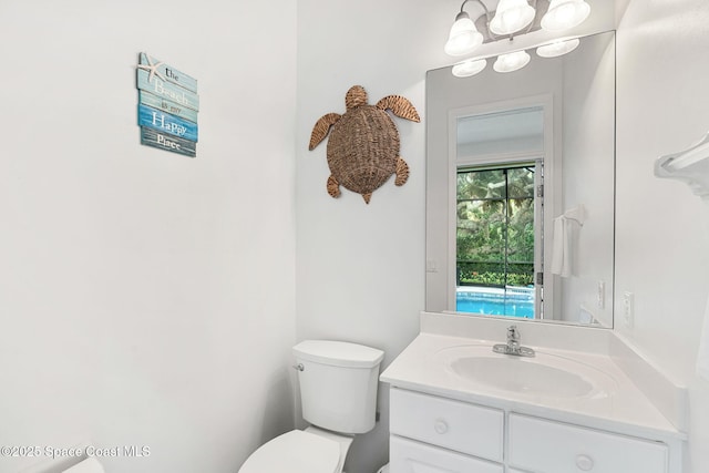 172 Whaler Dr, Melbourne Beach, FL 32951 - half bathroom with toilet and vanity