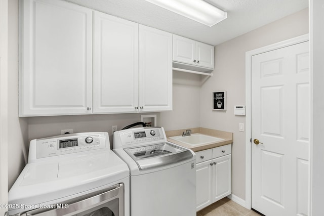 172 Whaler Dr, Melbourne Beach, FL 32951 - laundry area with separate washer and dryer, cabinet space, and light tile patterned flooring