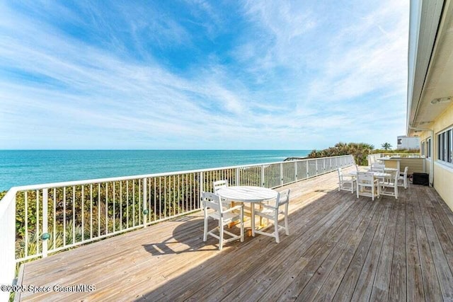 172 Whaler Dr, Melbourne Beach, FL 32951 - deck with outdoor dining space and a water view
