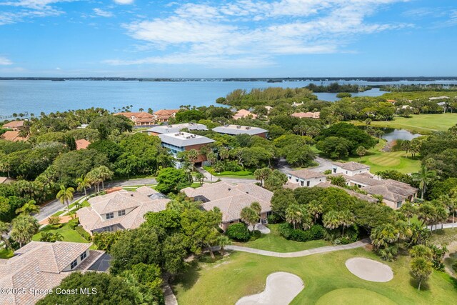 172 Whaler Dr, Melbourne Beach, FL 32951 - aerial view of residential area featuring a golf course and a large body of water