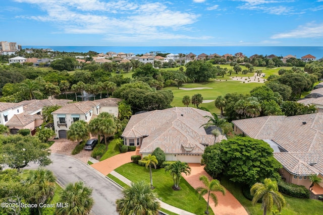 172 Whaler Dr, Melbourne Beach, FL 32951 - aerial view of residential area with a golf course and a large body of water