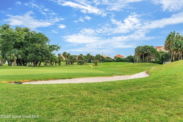 172 Whaler Dr, Melbourne Beach, FL 32951 - view of home's community with a lawn and view of golf course