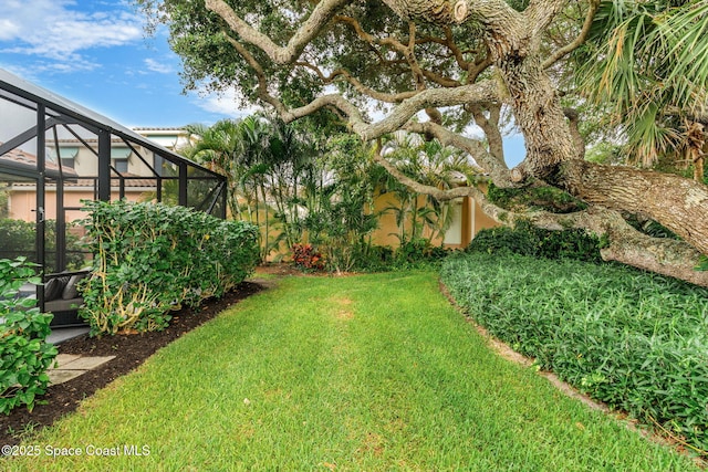 172 Whaler Dr, Melbourne Beach, FL 32951 - view of yard featuring glass enclosure