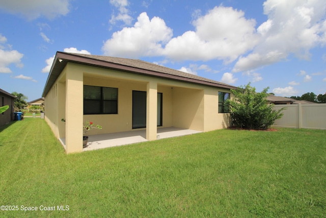 947 Remington Green Dr SE, Palm Bay, FL 32909 - rear view of property featuring a patio area and stucco siding