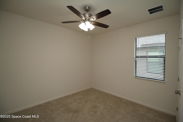 947 Remington Green Dr SE, Palm Bay, FL 32909 - spare room with light carpet and a ceiling fan