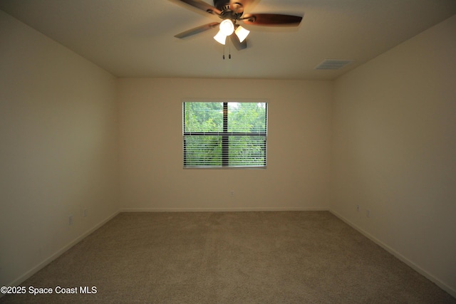 947 Remington Green Dr SE, Palm Bay, FL 32909 - carpeted empty room featuring a ceiling fan and baseboards
