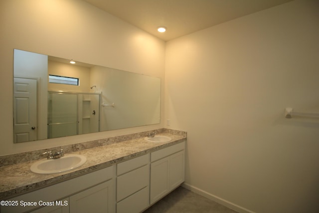 947 Remington Green Dr SE, Palm Bay, FL 32909 - full bath featuring a stall shower and double vanity