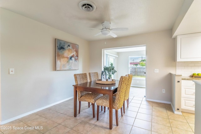 1768 Hudson Cir S, Melbourne, FL 32935 - dining room with ceiling fan and light tile patterned flooring