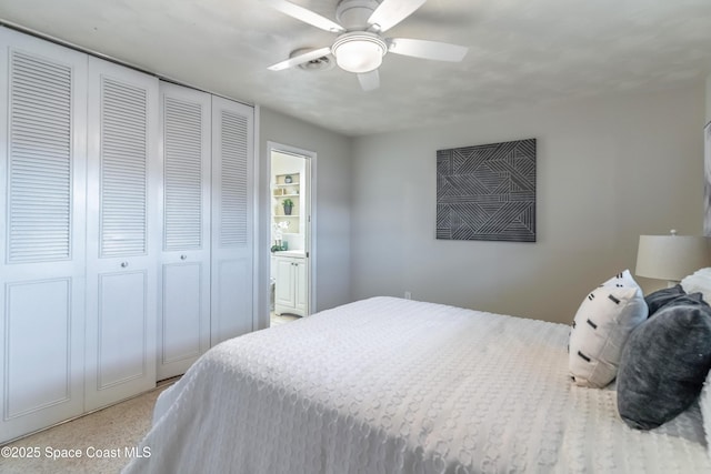 1768 Hudson Cir S, Melbourne, FL 32935 - bedroom with a closet, a ceiling fan, and carpet floors