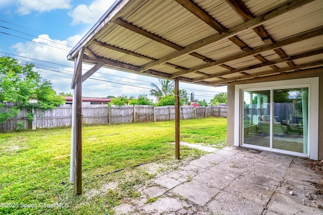 1768 Hudson Cir S, Melbourne, FL 32935 - fenced backyard featuring a patio