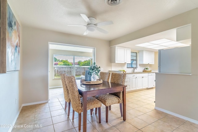 1768 Hudson Cir S, Melbourne, FL 32935 - dining room featuring light tile patterned floors and a ceiling fan