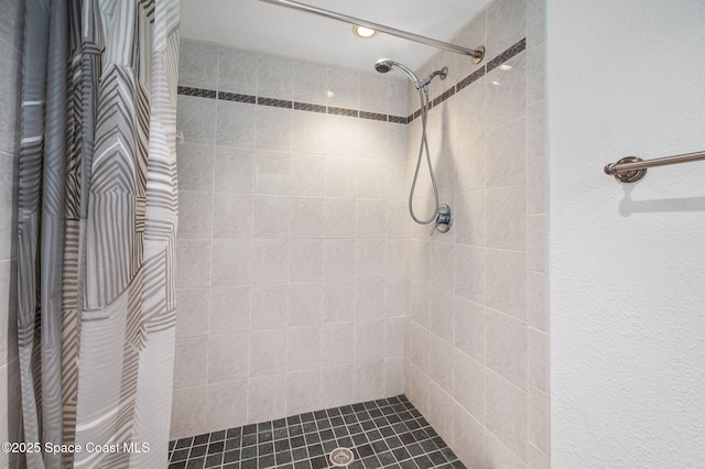 1727 Minutemen Cswy Unit 108, Cocoa Beach, FL 32931 - bathroom with a tile shower