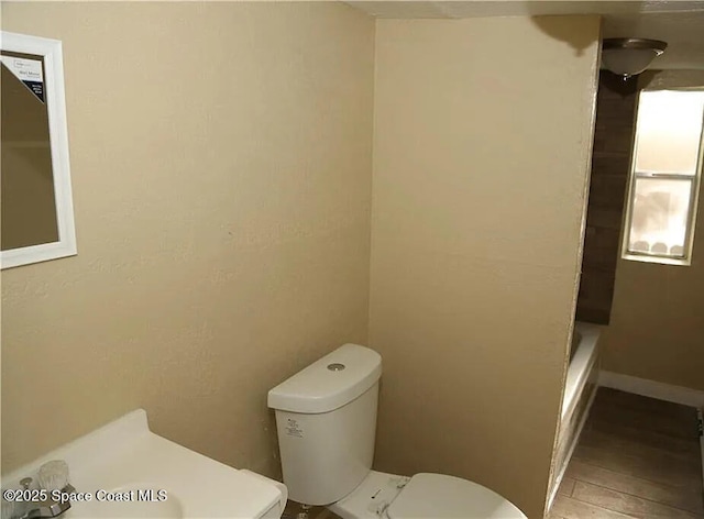 1038 W 10th St, Lakeland, FL 33805 - full bathroom with toilet and vanity