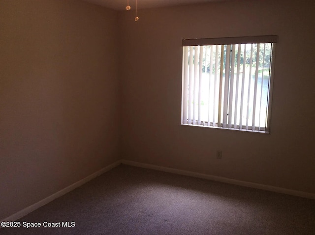 33 Kings Colony Ct, Palm Coast, FL 32137 - carpeted spare room with baseboards