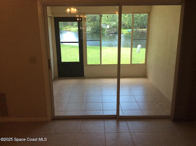 33 Kings Colony Ct, Palm Coast, FL 32137 - unfurnished sunroom featuring a water view
