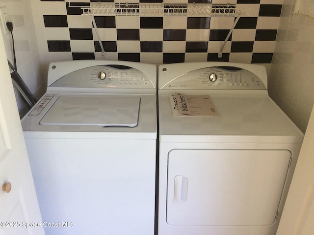 33 Kings Colony Ct, Palm Coast, FL 32137 - washroom with washing machine and clothes dryer
