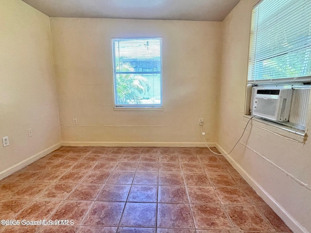 316 Bay Ave, Cocoa, FL 32922 - unfurnished room featuring baseboards and cooling unit