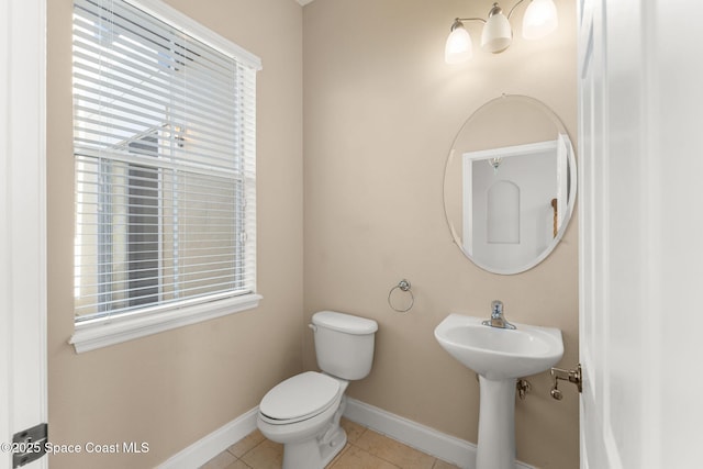 2032 Elkins Pt, Melbourne, FL 32935 - bathroom with toilet and tile patterned flooring