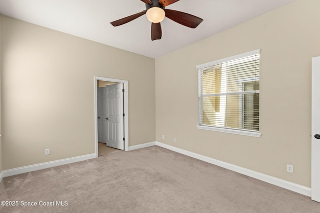 2032 Elkins Pt, Melbourne, FL 32935 - empty room with a ceiling fan and light colored carpet