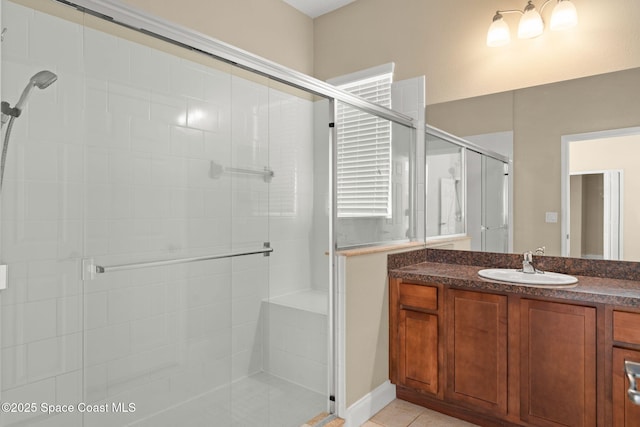 2032 Elkins Pt, Melbourne, FL 32935 - full bath featuring vanity, a shower stall, and tile patterned floors