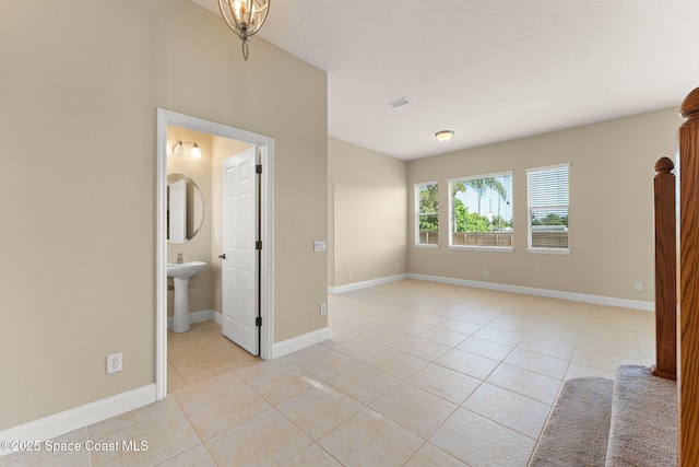 2032 Elkins Pt, Melbourne, FL 32935 - empty room with light tile patterned floors