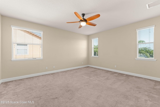 2032 Elkins Pt, Melbourne, FL 32935 - empty room featuring ceiling fan and light carpet