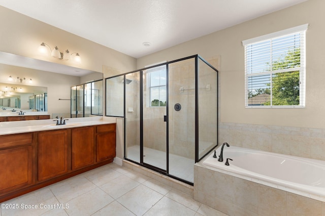2032 Elkins Pt, Melbourne, FL 32935 - bathroom featuring a bath, vanity, a stall shower, and tile patterned floors