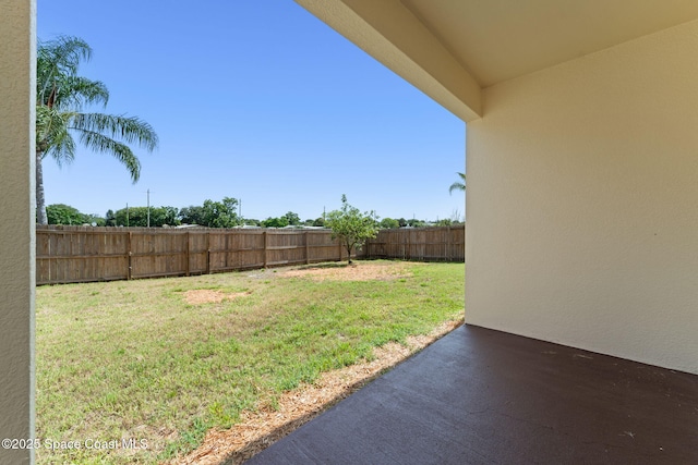 2032 Elkins Pt, Melbourne, FL 32935 - fenced backyard featuring a patio