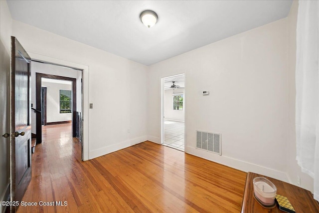 415 2nd Ave, Indialantic, FL 32903 - empty room with wood finished floors and ceiling fan