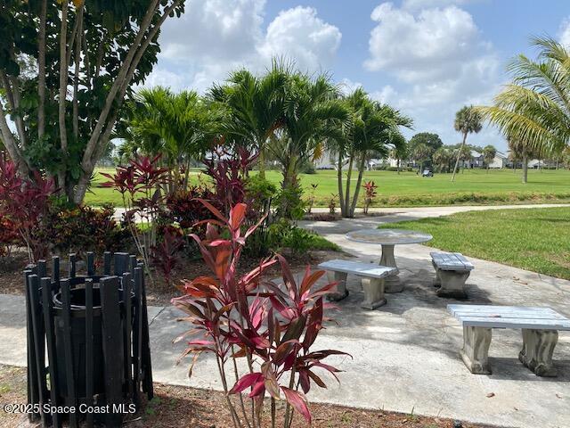 2727 N Wickham Rd # 106-7, Melbourne, FL 32935 - view of home's community featuring a lawn