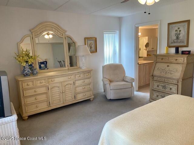 2727 N Wickham Rd # 106-7, Melbourne, FL 32935 - bedroom featuring light colored carpet and ensuite bathroom