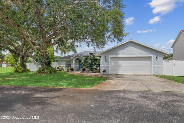 1036 Greenleaf Ct, Rockledge, FL 32955 - single story home with driveway, stucco siding, and a garage