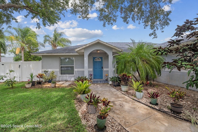 1036 Greenleaf Ct, Rockledge, FL 32955 - view of front of property featuring stucco siding and a shingled roof