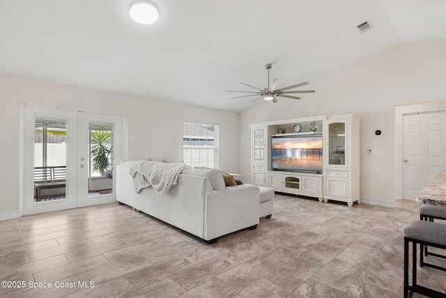 1036 Greenleaf Ct, Rockledge, FL 32955 - living room featuring vaulted ceiling, a ceiling fan, and french doors