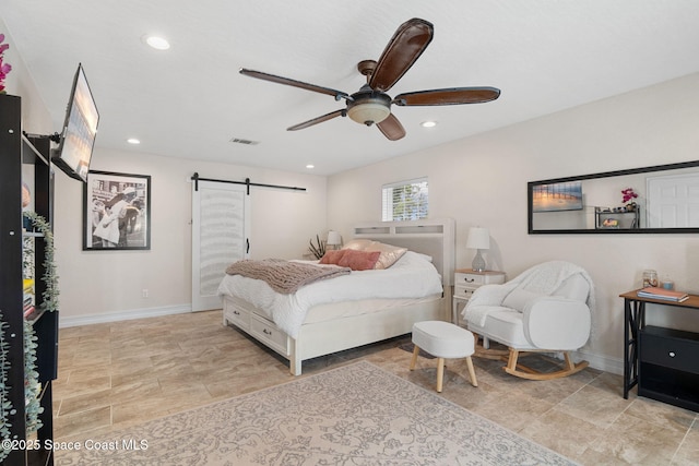 1036 Greenleaf Ct, Rockledge, FL 32955 - bedroom with a barn door, recessed lighting, and a ceiling fan
