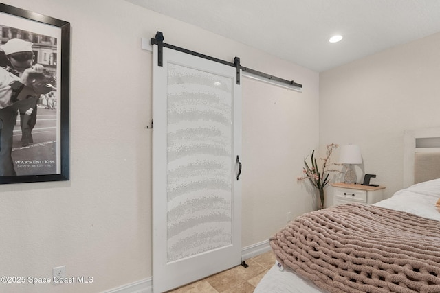 1036 Greenleaf Ct, Rockledge, FL 32955 - bedroom featuring a barn door and recessed lighting