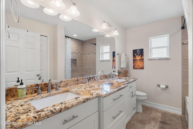 1036 Greenleaf Ct, Rockledge, FL 32955 - bathroom with double vanity and a shower with shower curtain