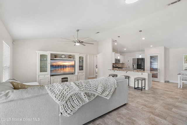 1036 Greenleaf Ct, Rockledge, FL 32955 - living room with a ceiling fan, lofted ceiling, and recessed lighting