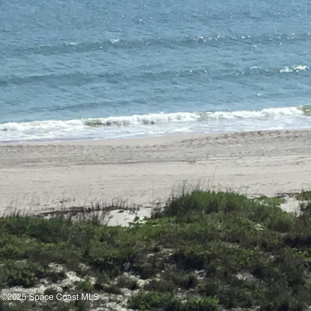 3170 N Atlantic Ave N Unit 403, Cocoa Beach, FL 32931 - water view featuring nearby beach